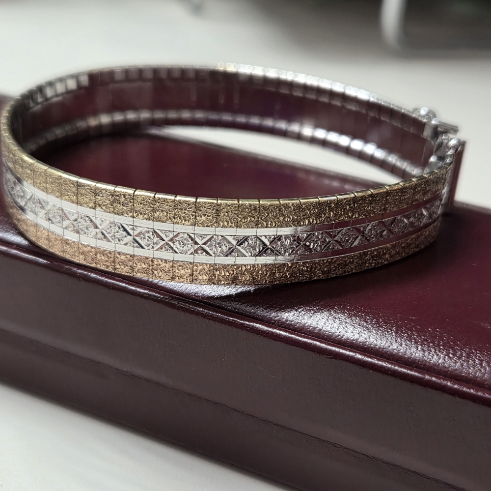 Elegant Silver and Gold Bangle Bracelet